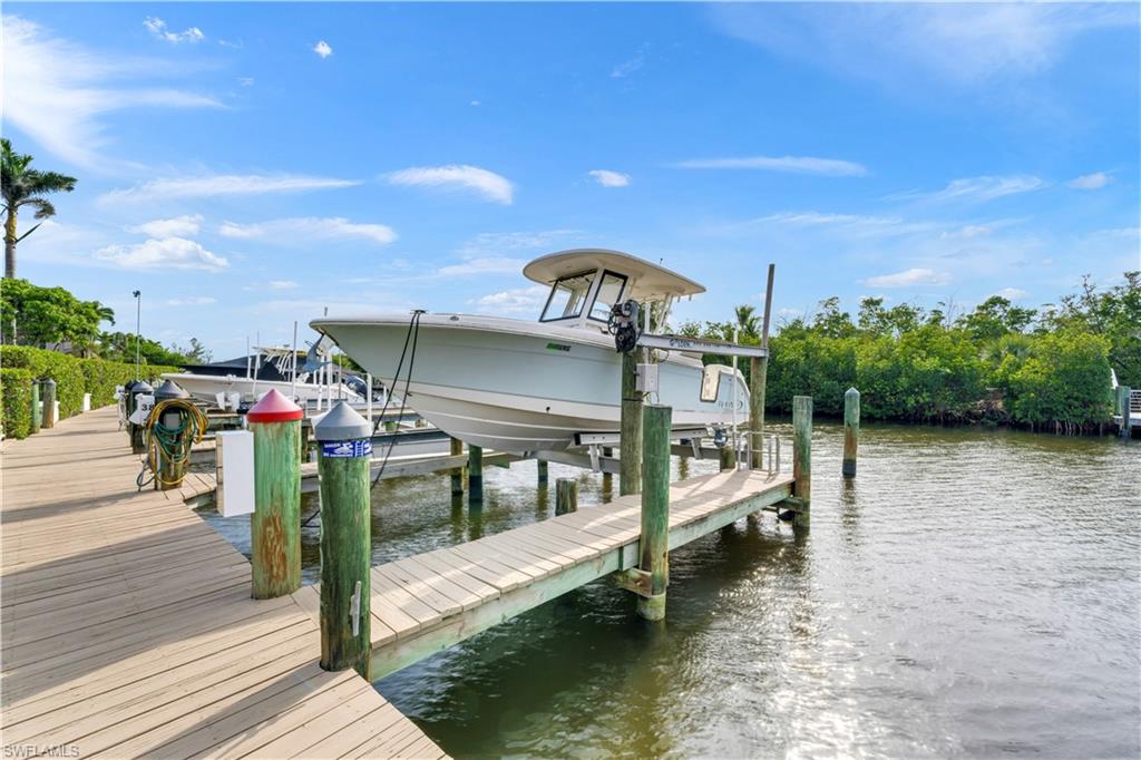 Dock to accommodate 35’ boat with 10k lb premium lift. HOA maintains dock! Boat negotiable!