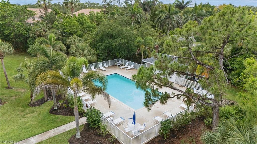 Community pool with a patio area