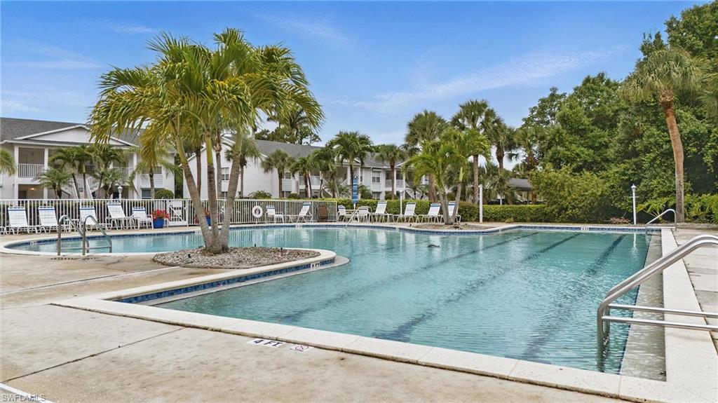 Community pool featuring a patio area