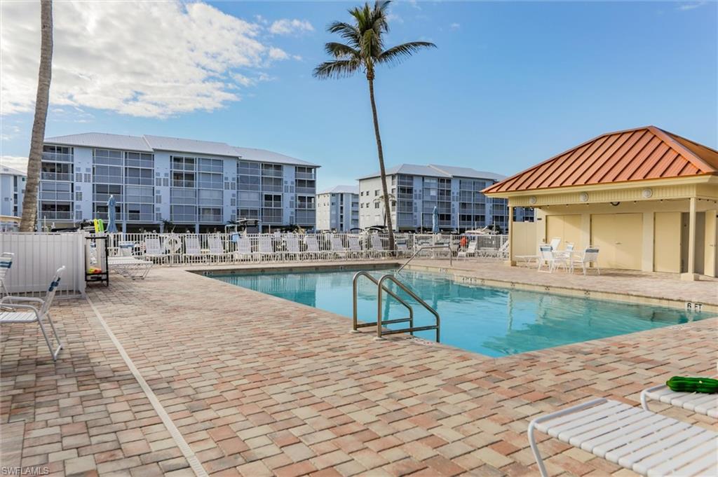 Community pool featuring a patio area