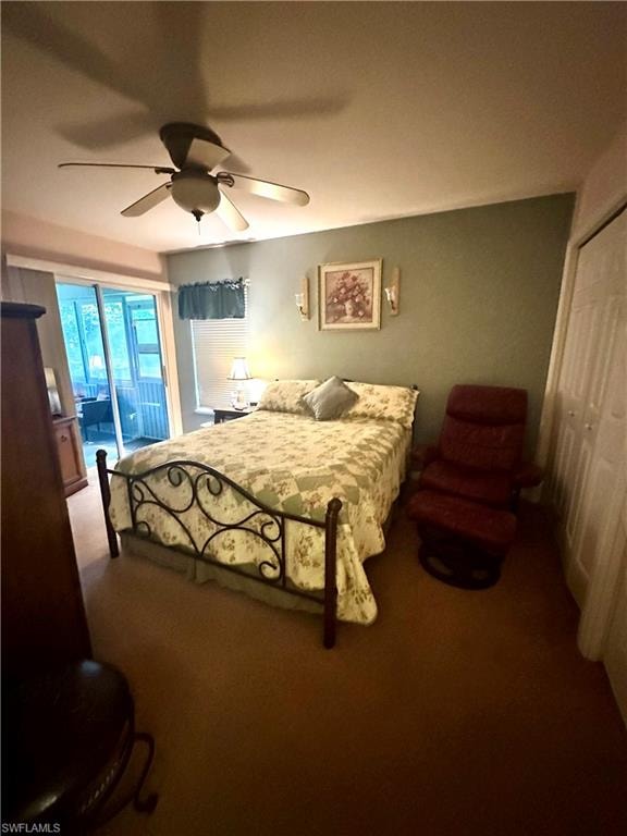 Bedroom featuring carpet flooring, access to outside, a ceiling fan, and a closet