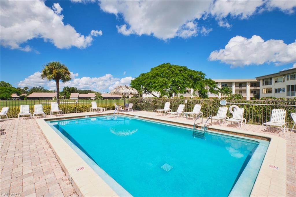 Community pool featuring a patio area