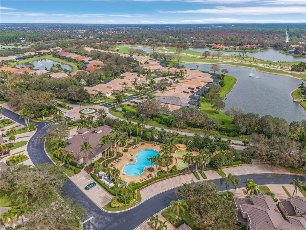 Aerial view of property's location featuring nearby suburban area and a large body of water