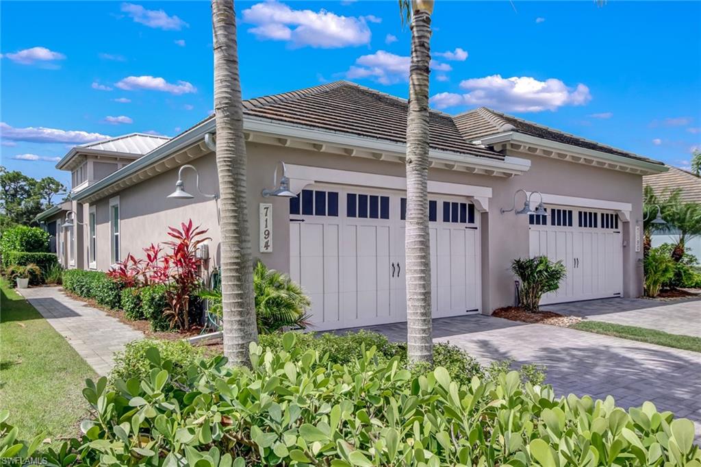 View of home's exterior with a garage