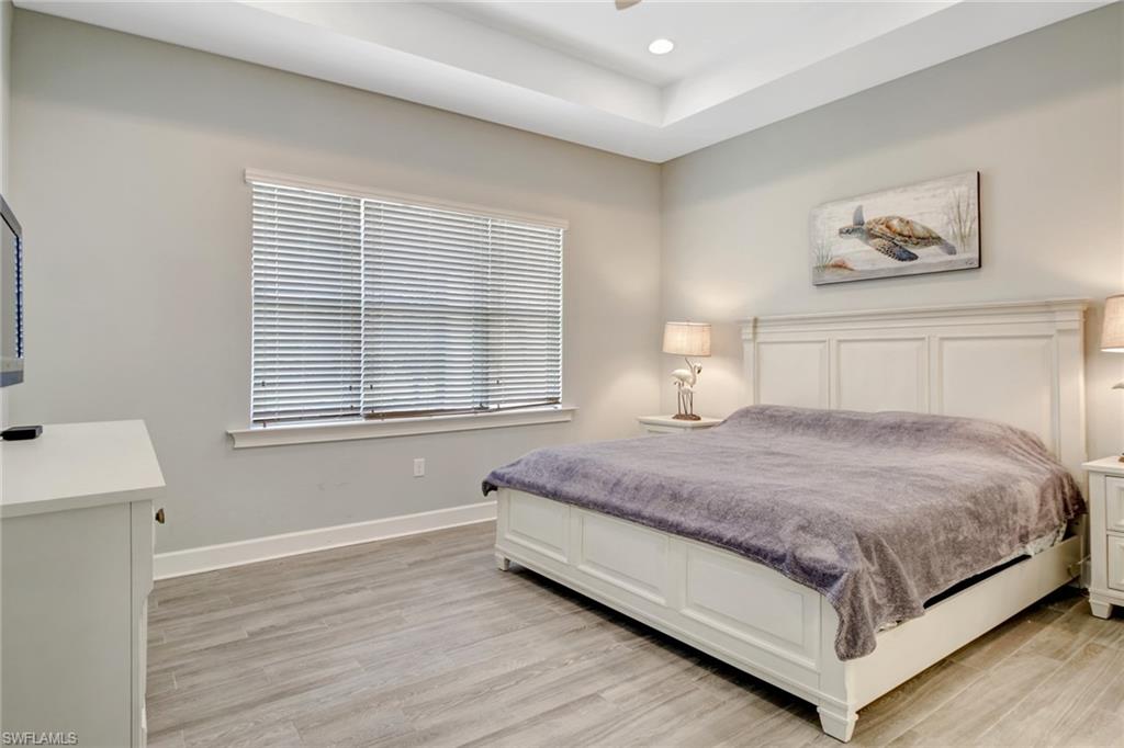 Bedroom with light hardwood / wood-style floors