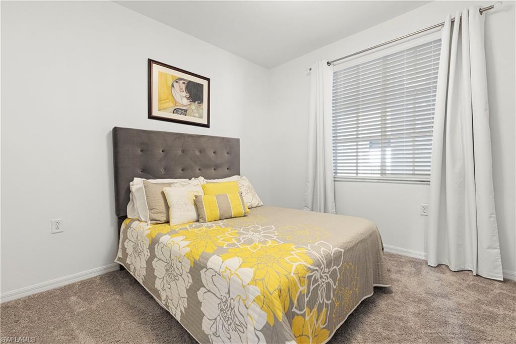 Bedroom featuring carpet