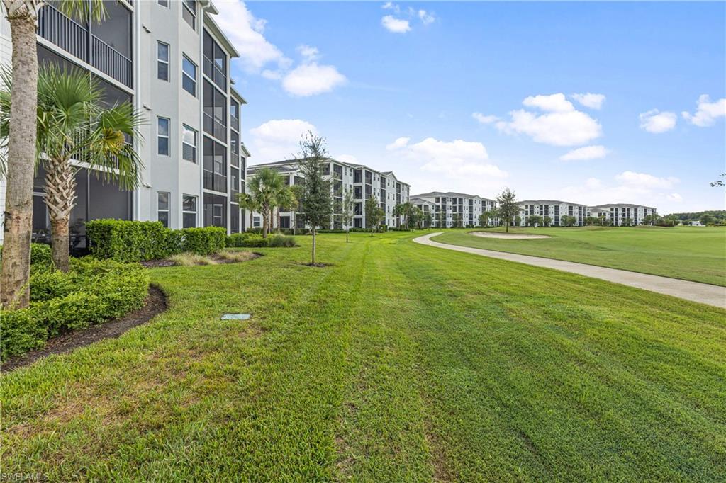 Surrounding community featuring a lawn