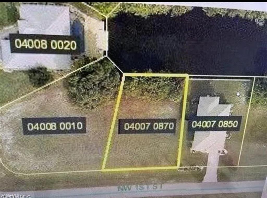 Aerial map of property and surrounding area with property parcel outlined