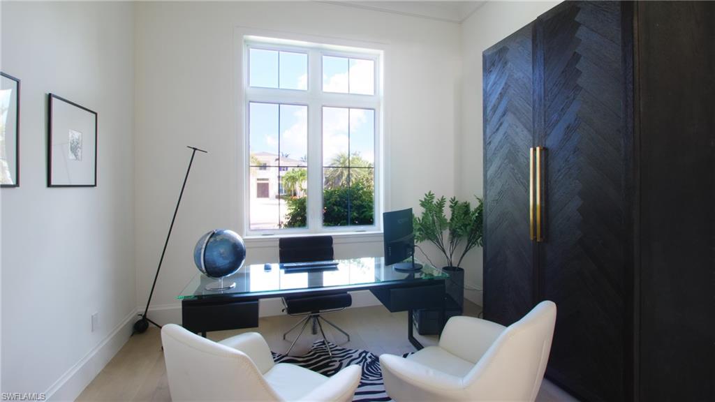 Office space featuring hardwood / wood-style floors