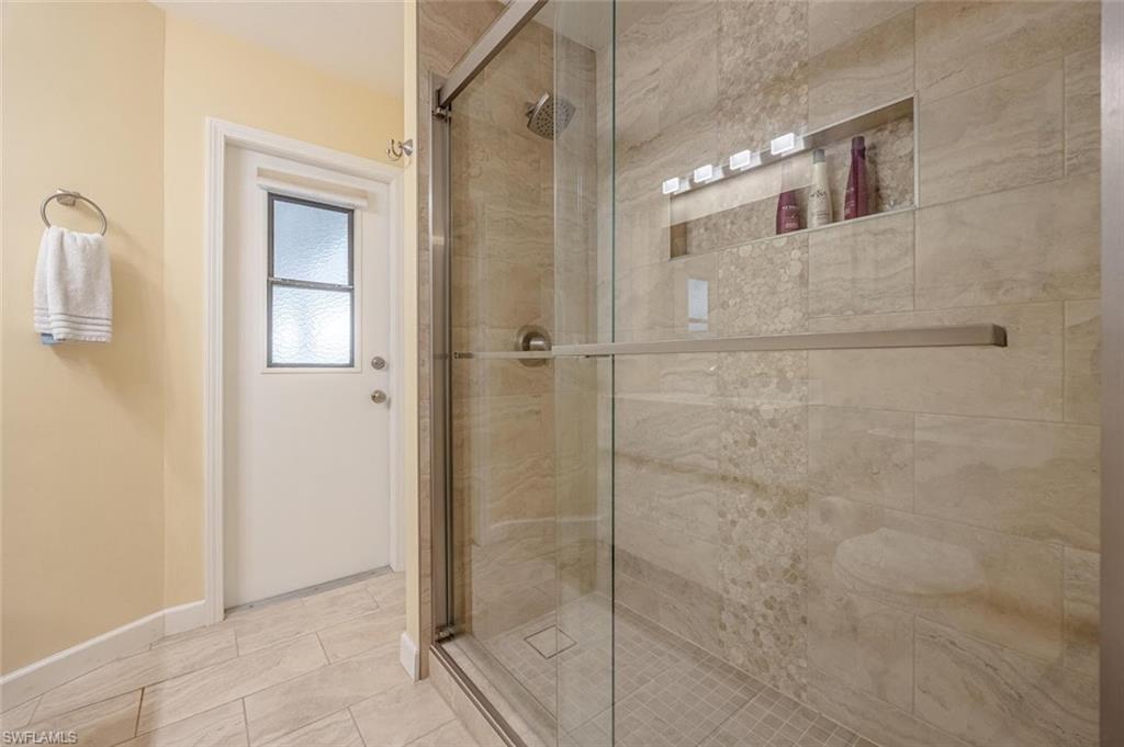 Bathroom featuring a shower stall