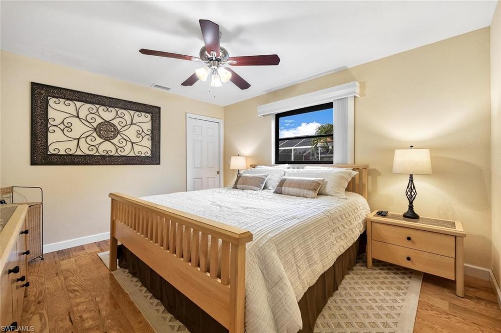 Bedroom featuring light wood finished floors and a ceiling fan