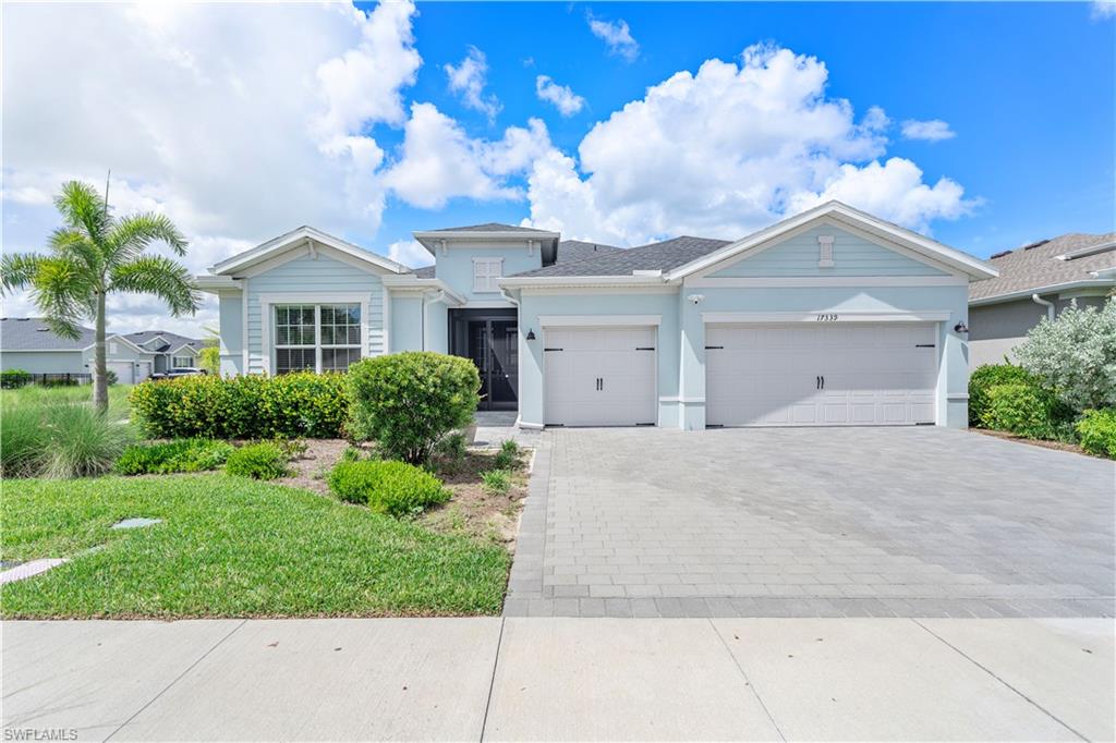 View of front of property with a garage