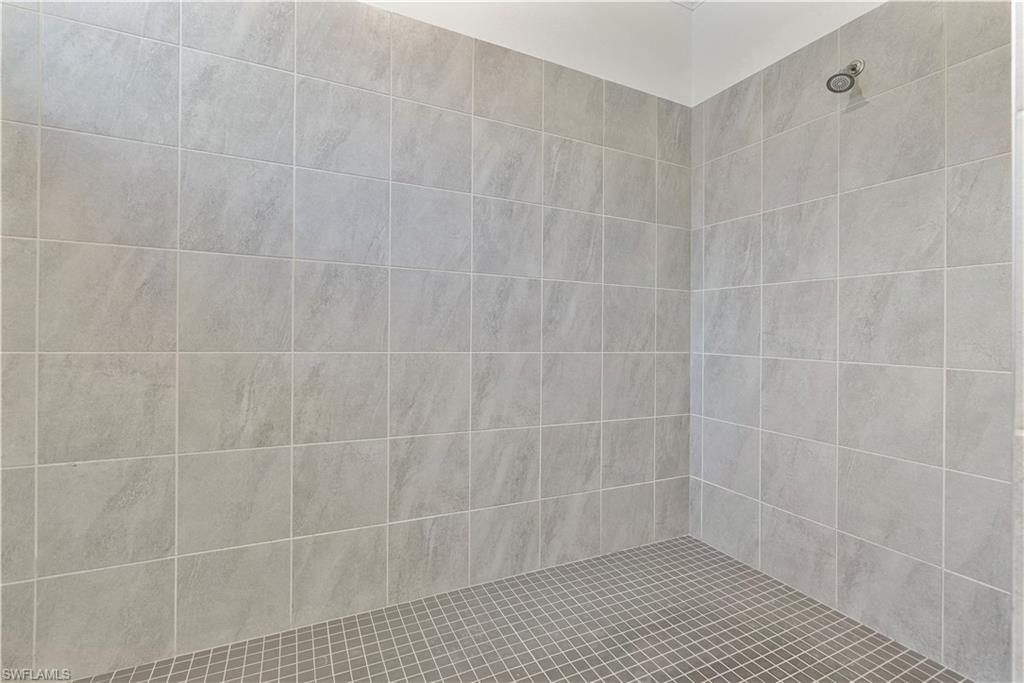 Bathroom with a tile shower