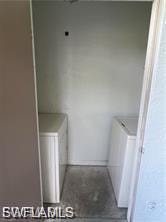 Property entrance featuring a yard and stucco siding