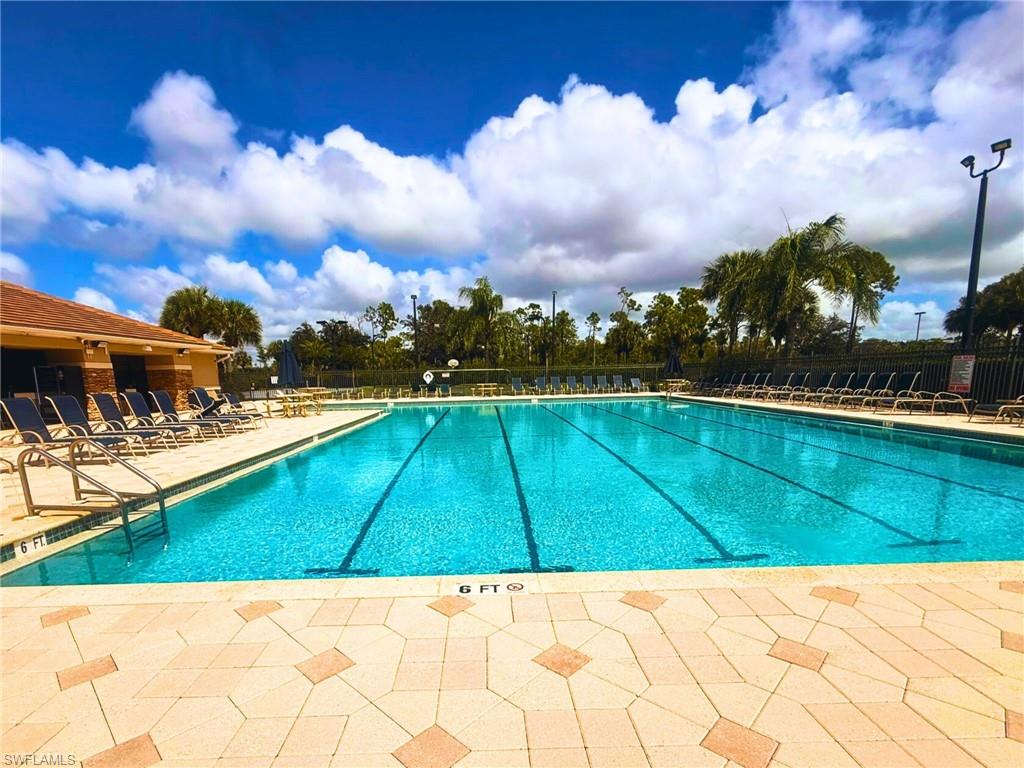 Community pool featuring a patio area