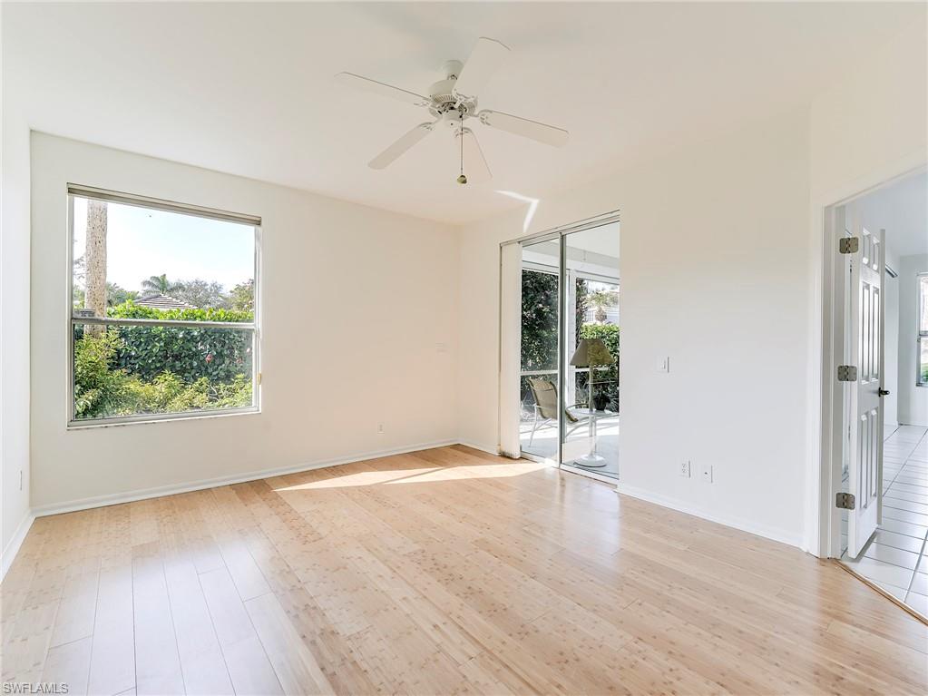 Unfurnished room featuring ceiling fan and light wood-style floors