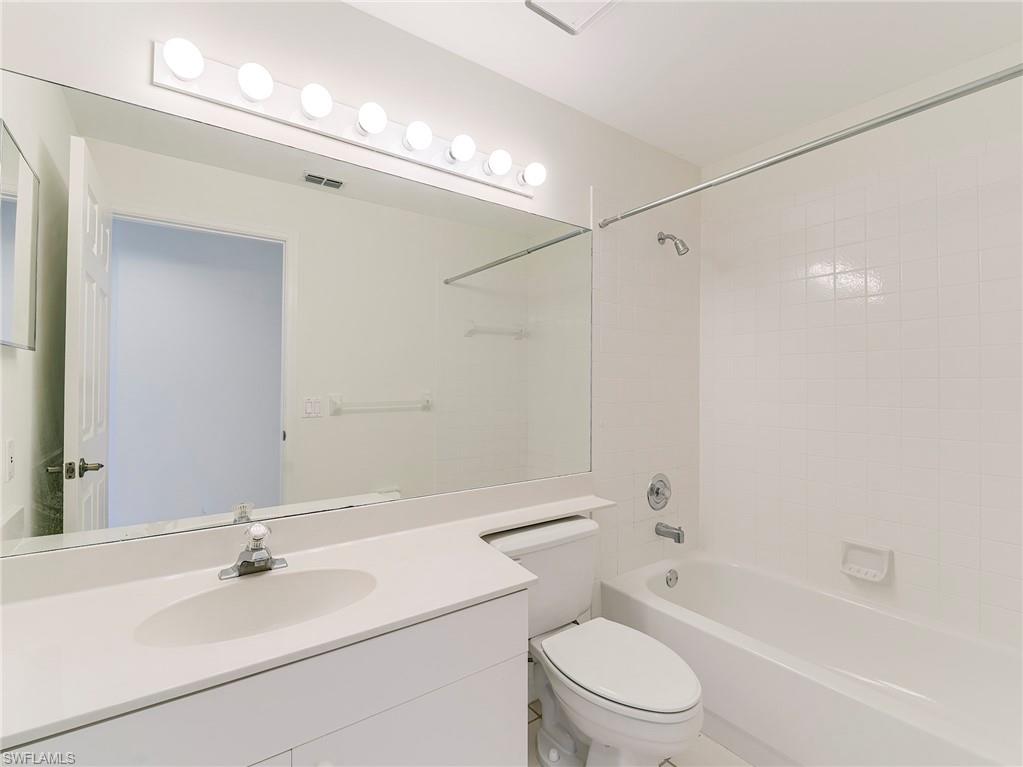 Full bath featuring bathing tub / shower combination and vanity