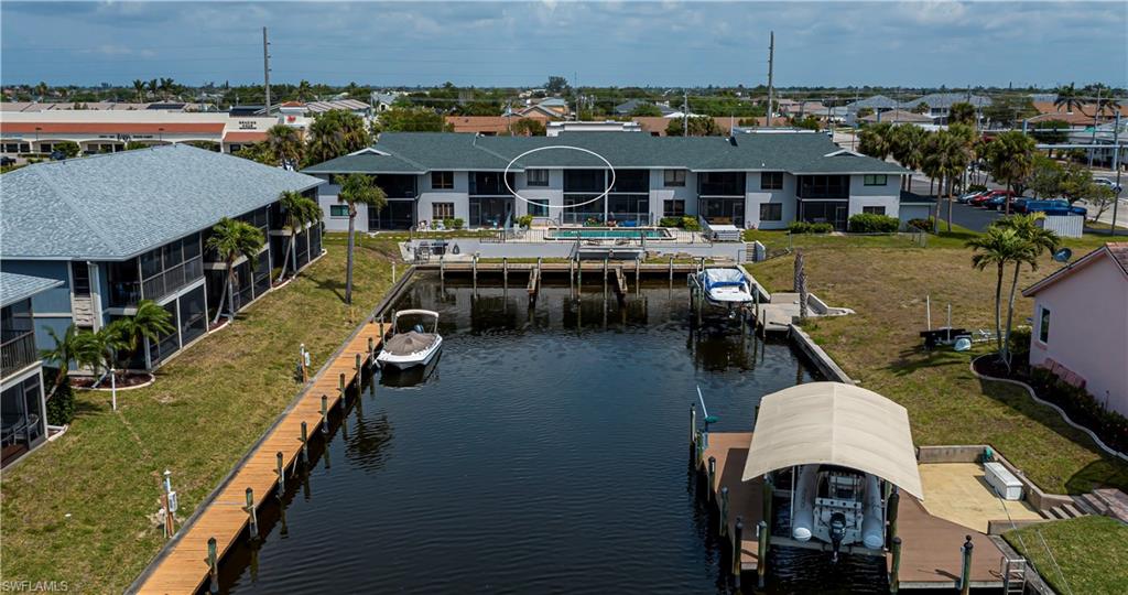 Aerial view of residential area with a nearby body of water