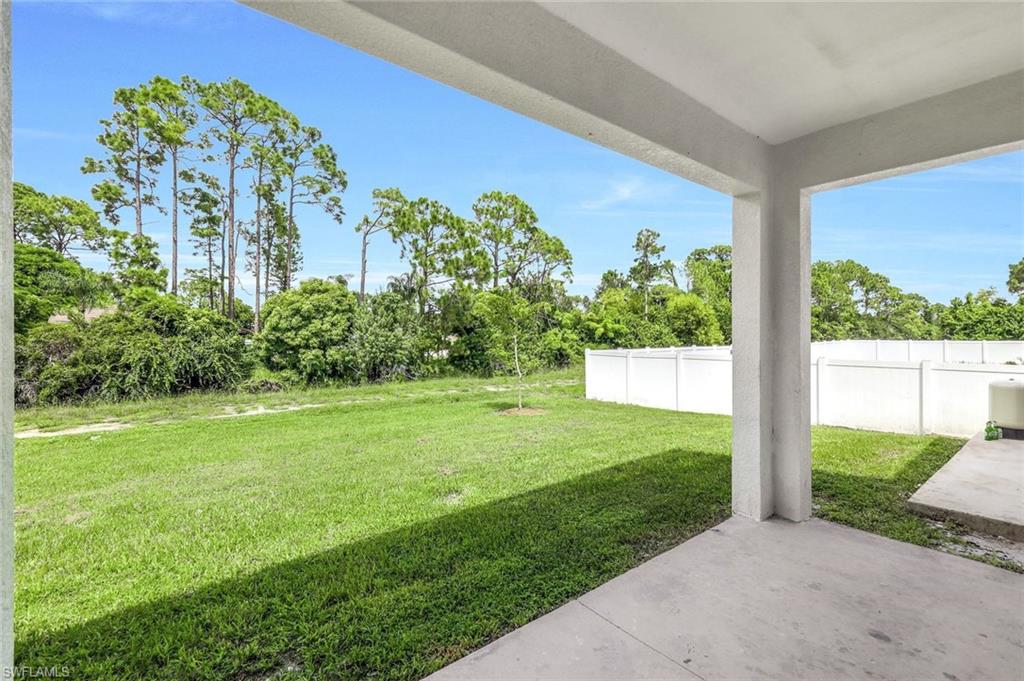 View of yard with a patio area