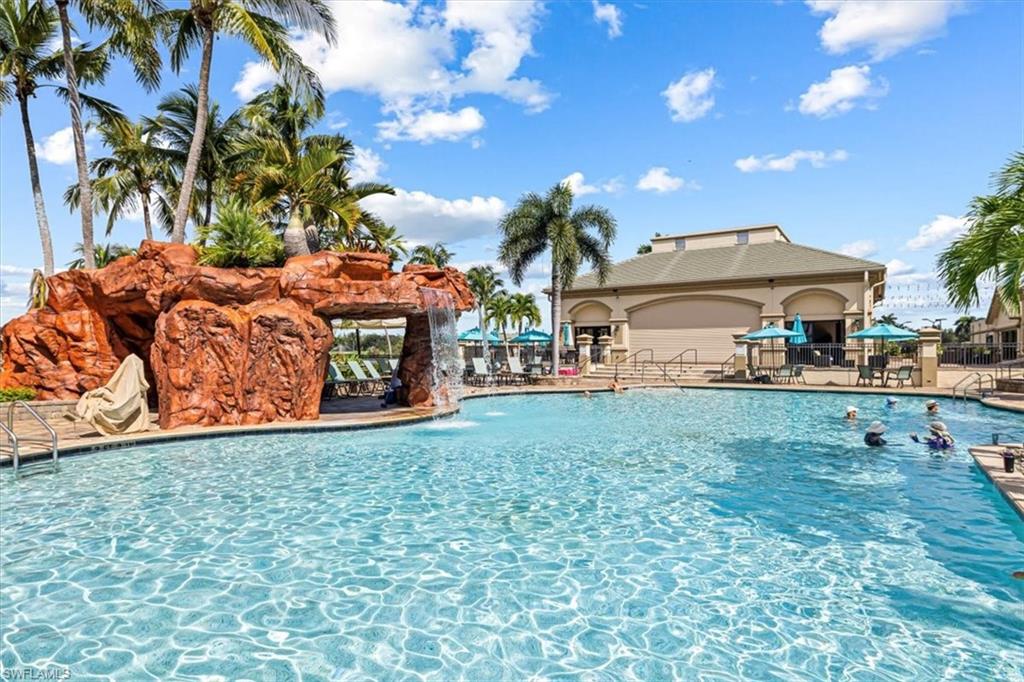 Community pool with a patio area