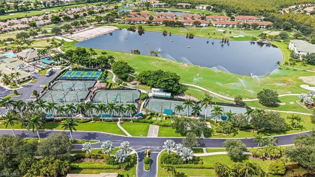 View of property location featuring a large body of water and nearby suburban area