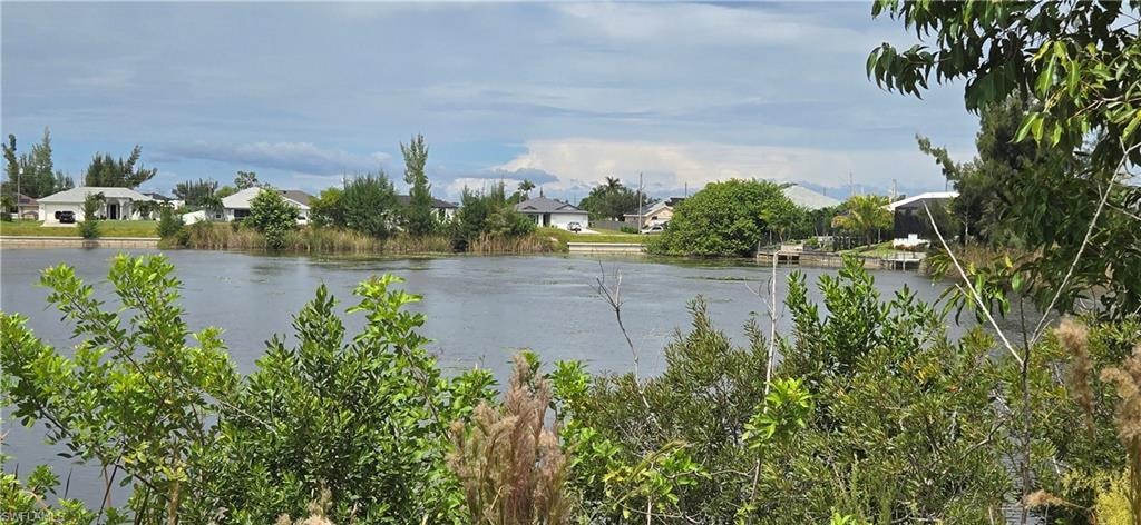 Water view with nearby suburban area