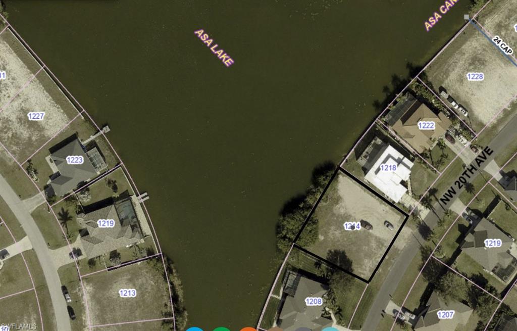 Aerial map of property and surrounding area featuring property parcel outlined