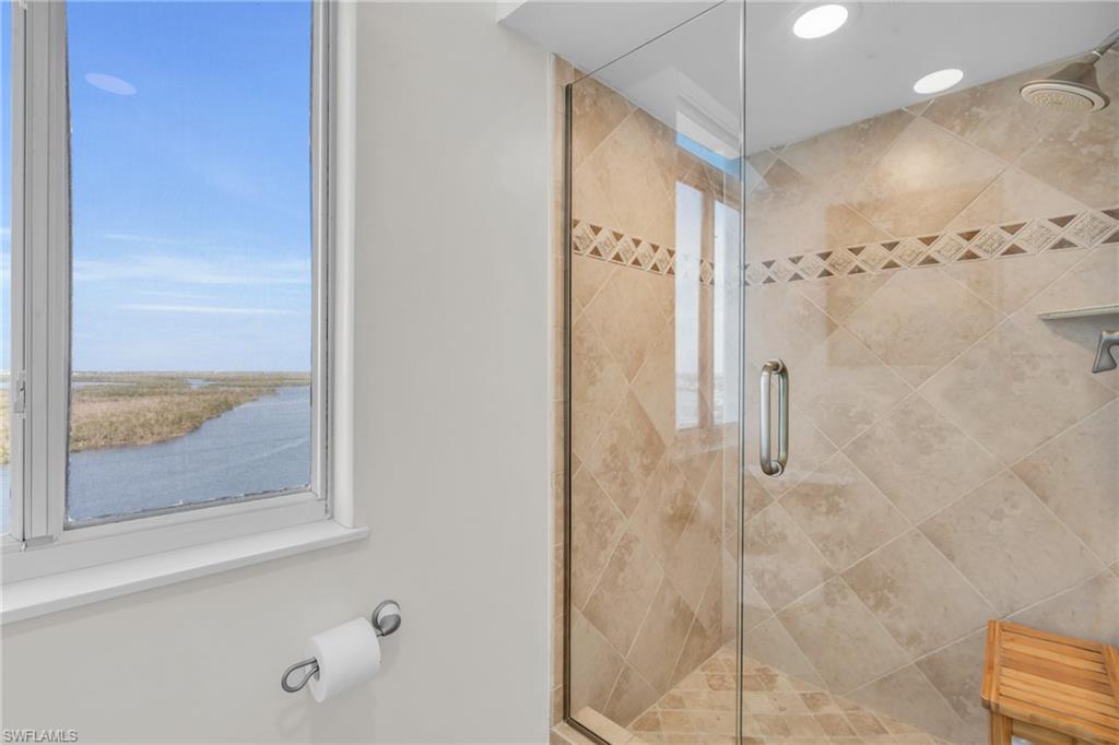 Bathroom with a shower with door / virtually enhanced image