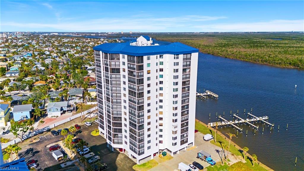 Drone / aerial view with a water view virtually enhanced image