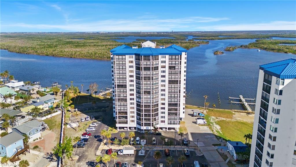 Drone / aerial view featuring a water view virtually enhanced image