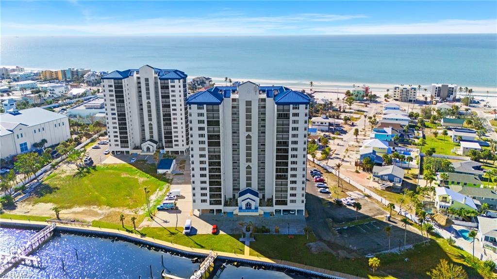 VIRTUALLY ENHANCED - Drone / aerial view featuring a water view