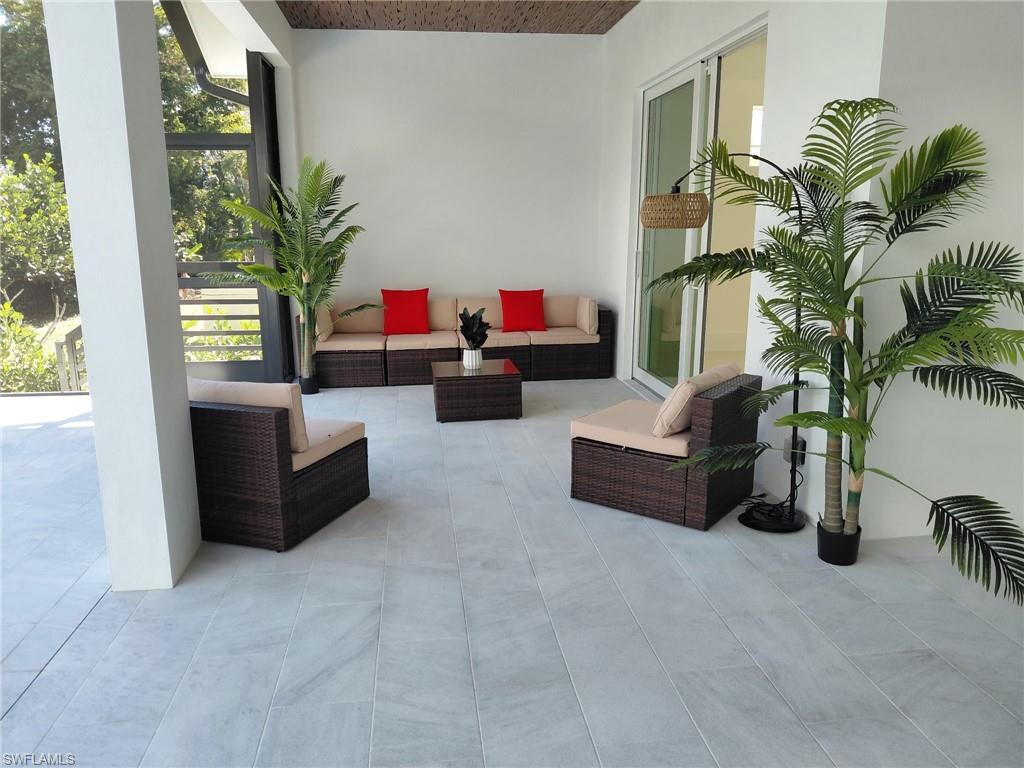 View of patio with an outdoor living space