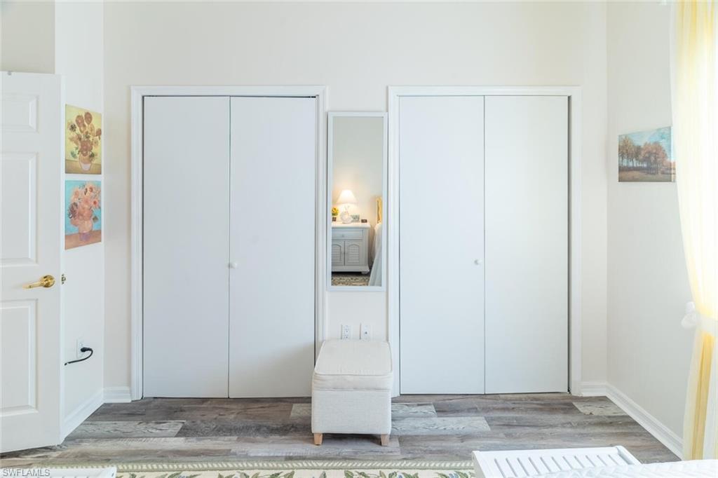 Bedroom with multiple closets