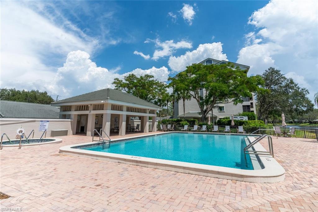 Community pool with a patio area