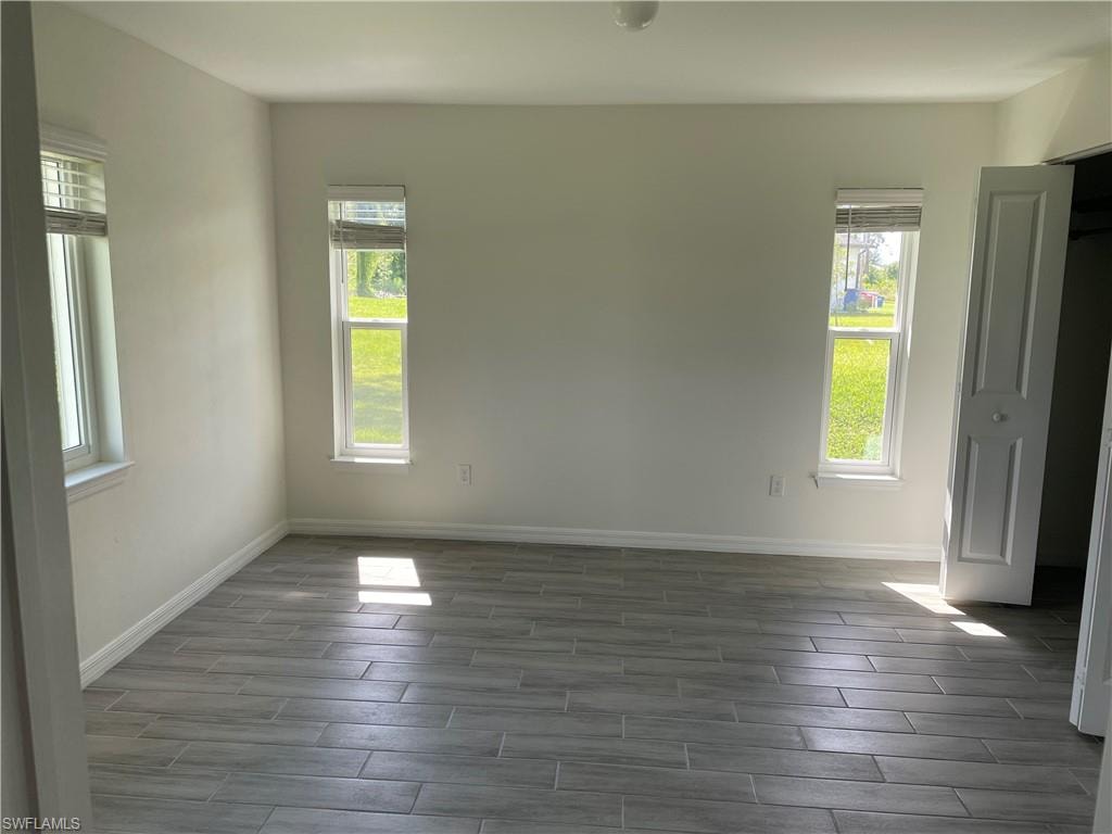 Primary bedroom featuring a wealth of natural light