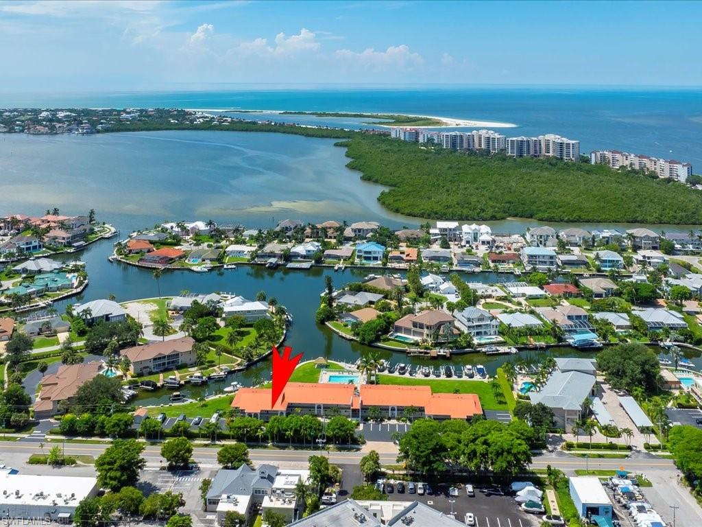 Aerial view of residential area with a large body of water