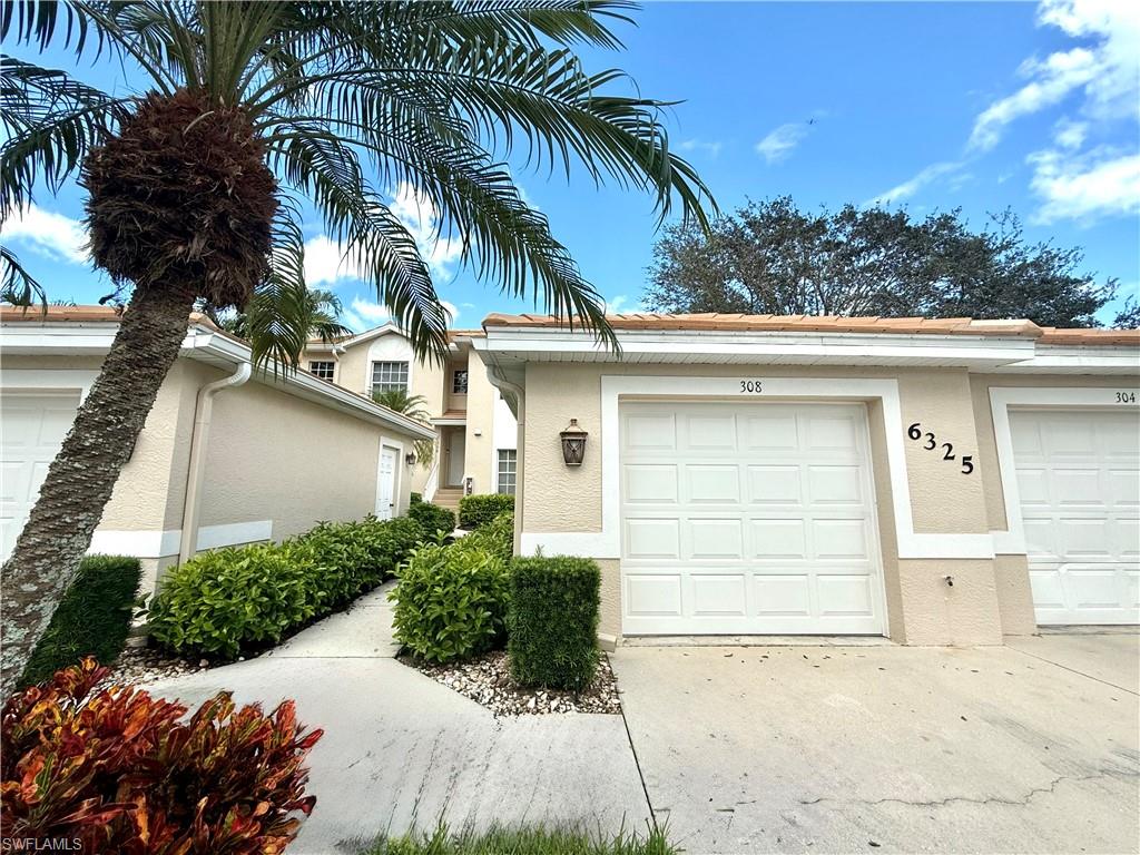 Front of the home with detached garage