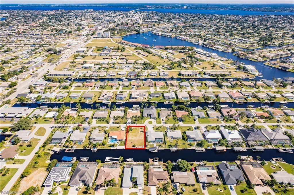 Aerial view of residential area with a large body of water