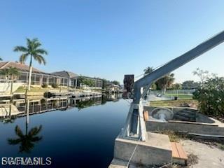 Dock featuring a water view