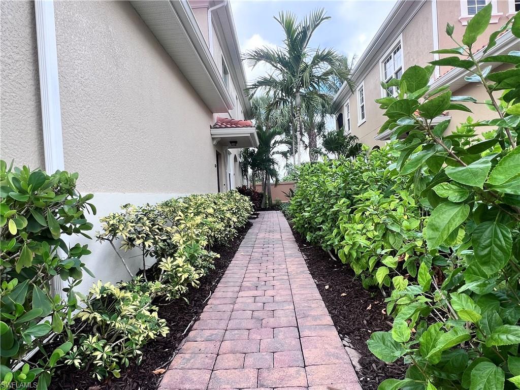 Walkway to front entrance door of condo