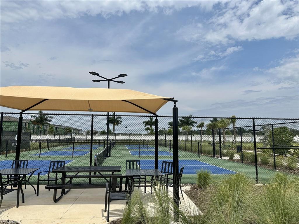 View of home's community with a bocce ball area