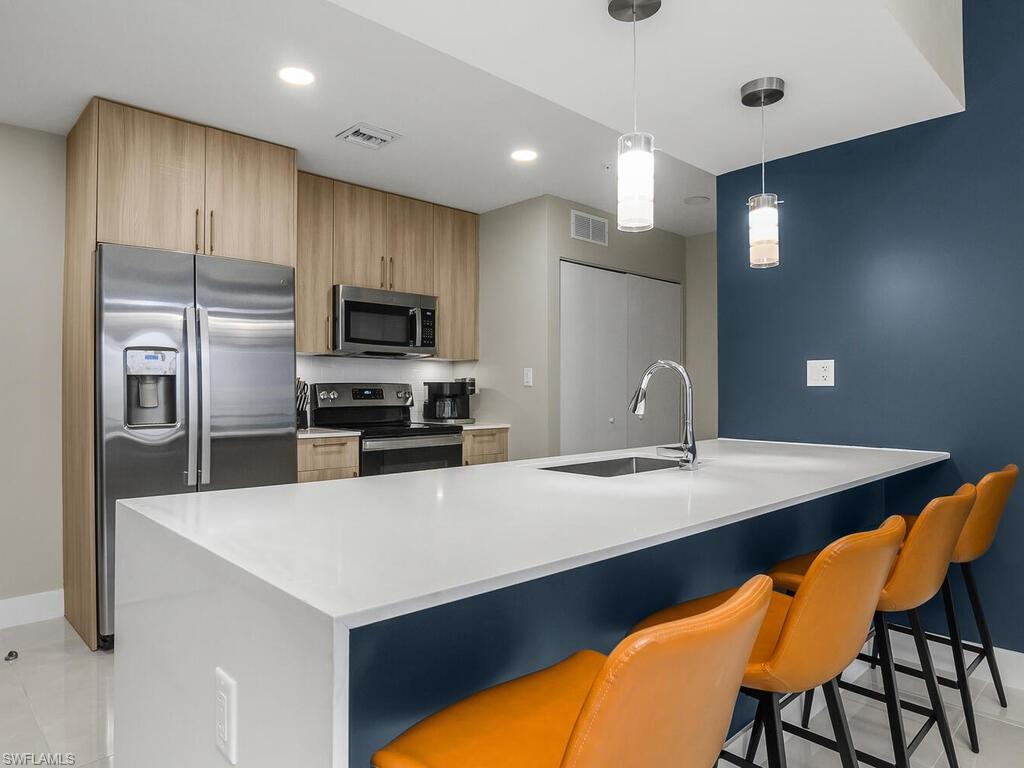 Modern Kitchen has it all including a waterfall center island.