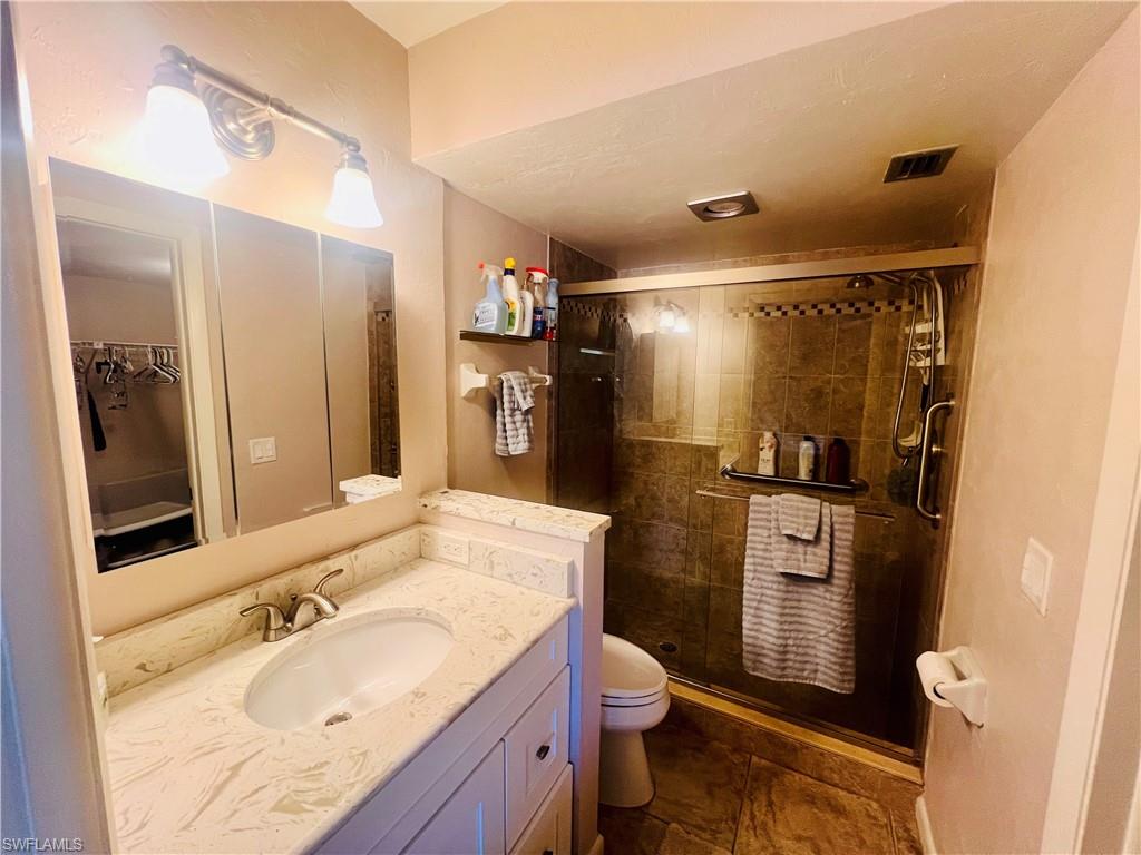Master Bathroom featuring vanity, walk in shower