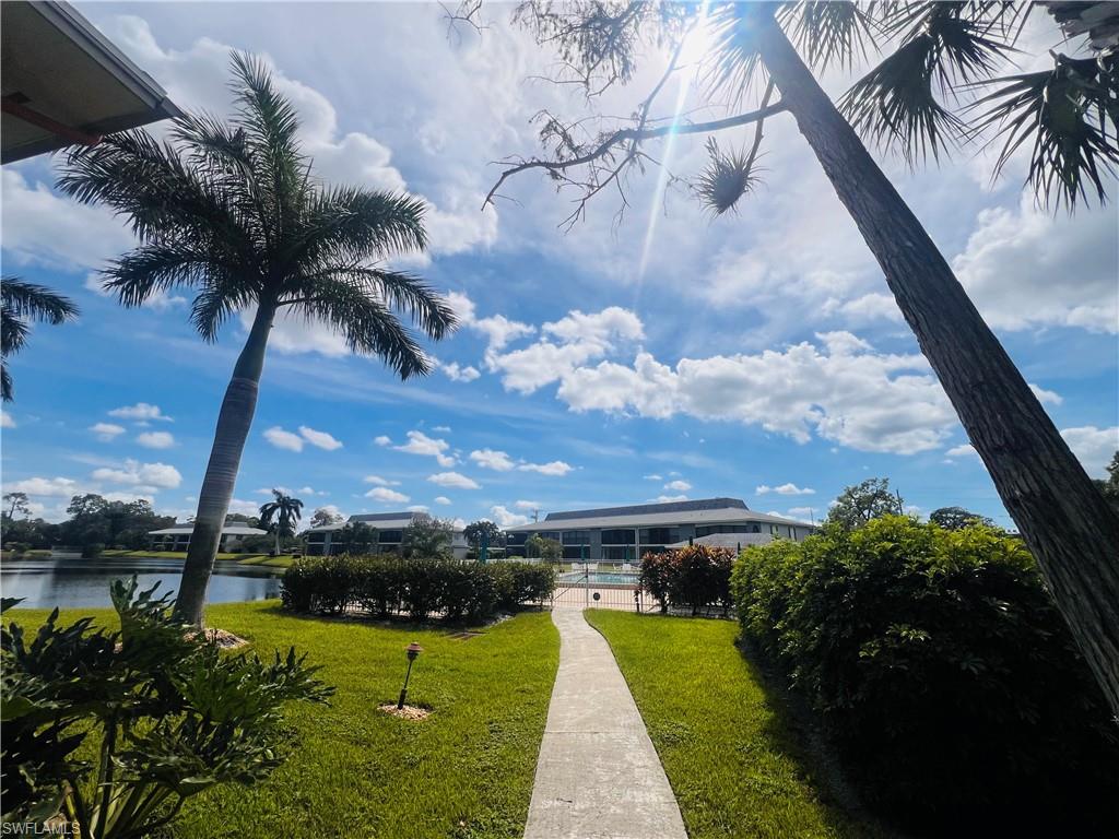 View of walkway leading to community pool