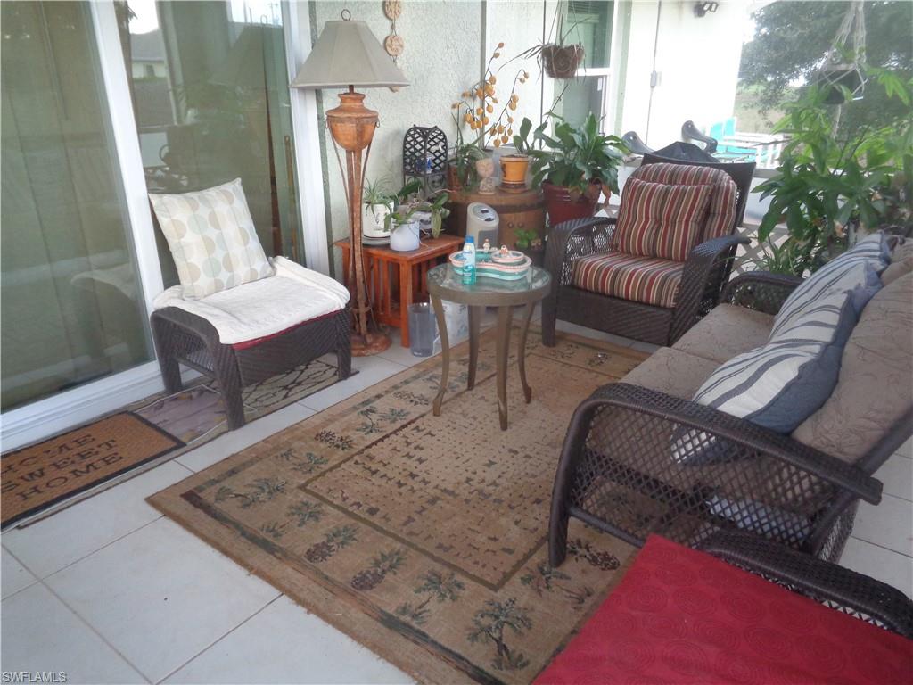 Back screened lanai with tile patterned floors