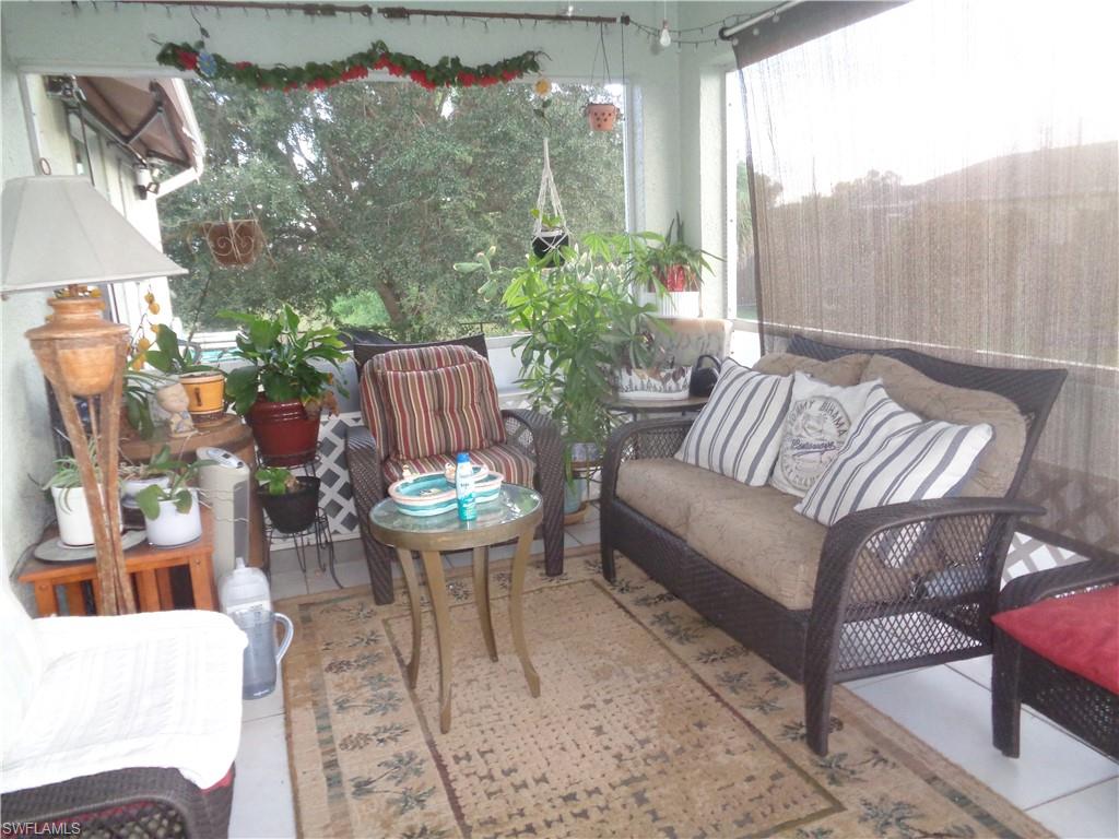 Back screened lanai with tile patterned floors