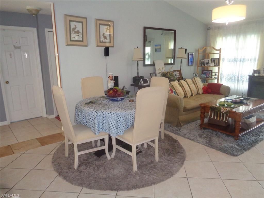 Dining room featuring light tile patterned flooring