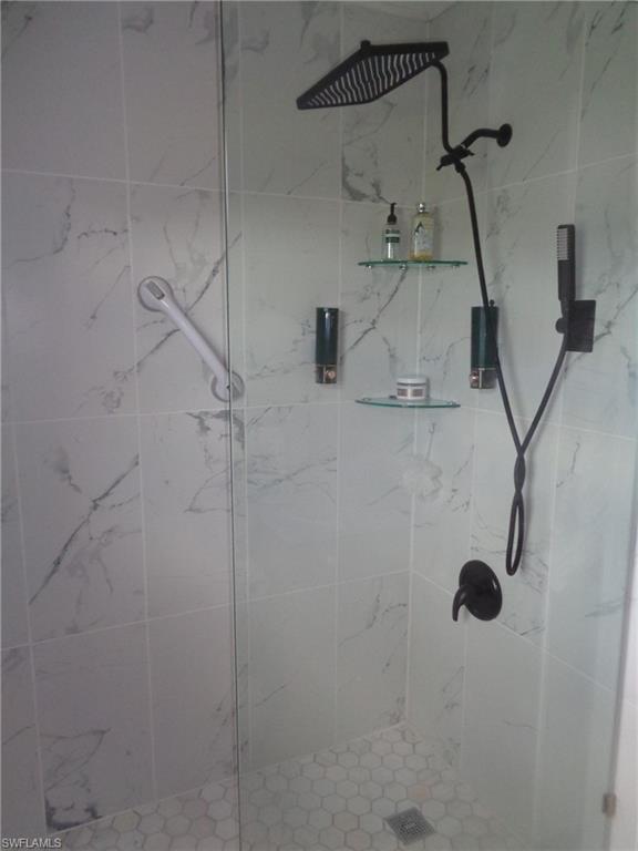Bathroom with a stall shower