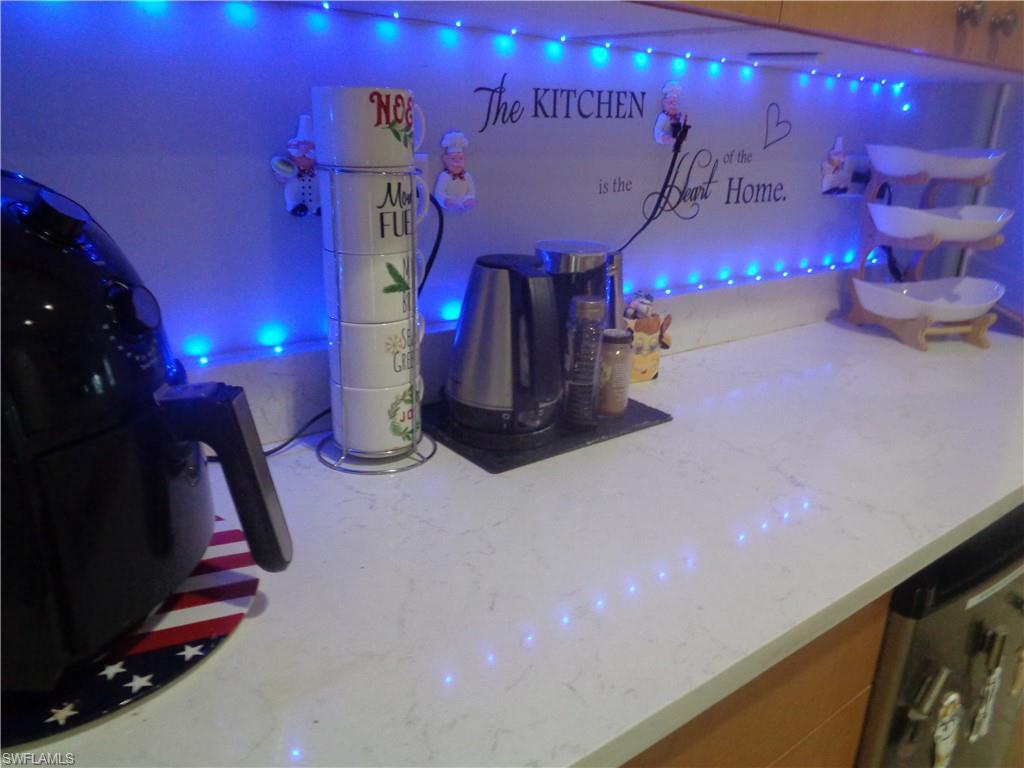 Cabinet area featuring light stone