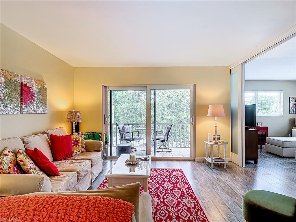 Living room featuring wood-type flooring